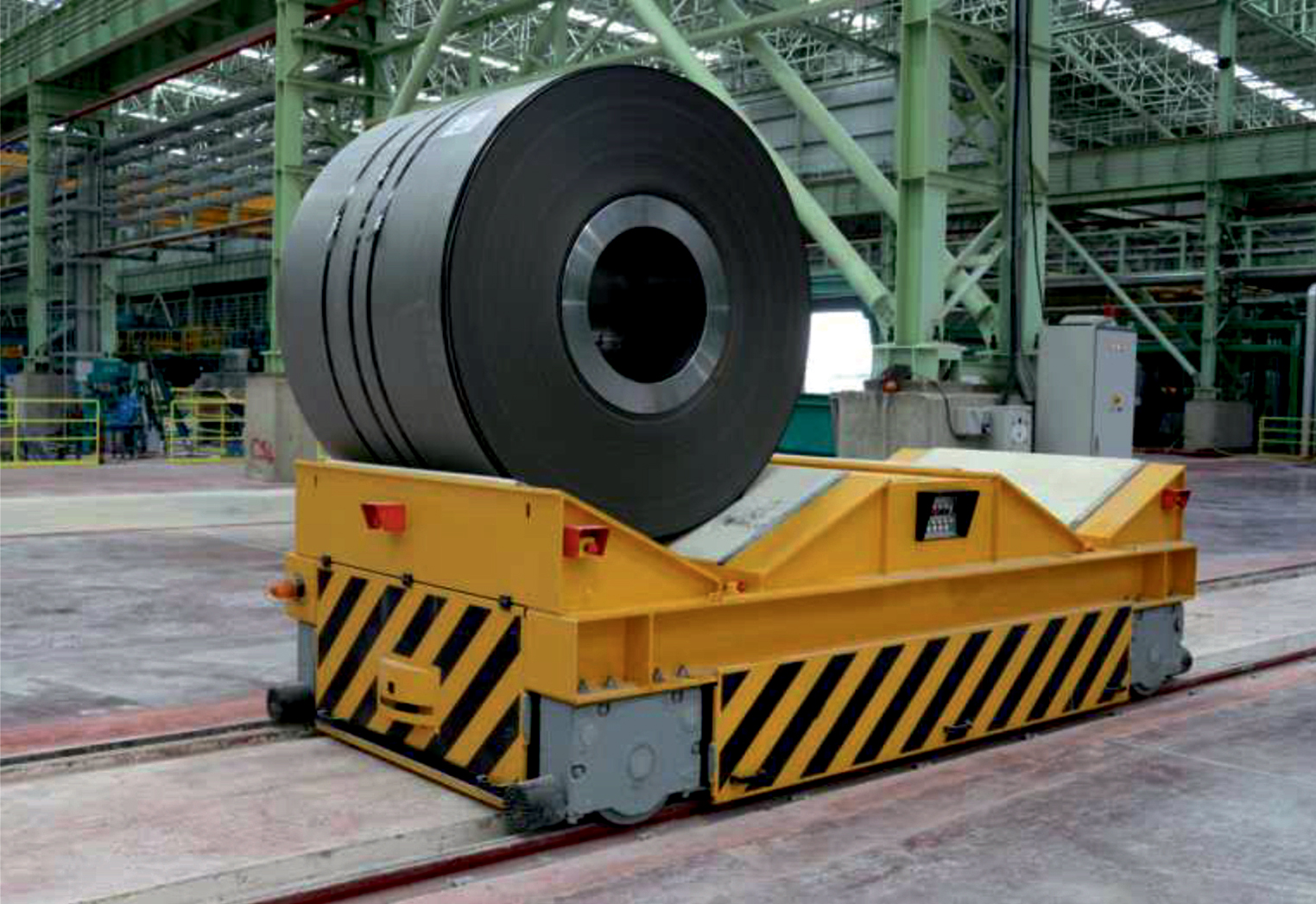 Грузозахватные механизмы: поворотные траверсы для бумажной и металлообрабатывающей промышленности, захваты для рулонов, С-крюки и многое другое